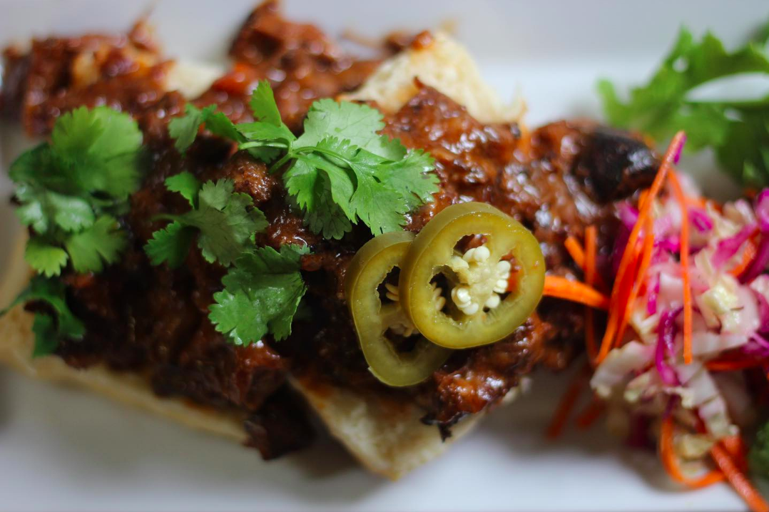 BBQ brisket on buttermilk biscuit